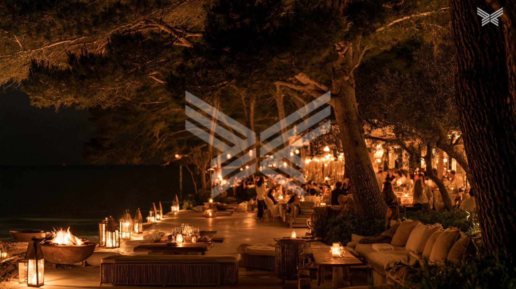 Night under the pines by the sea, lanterns and fire bowls