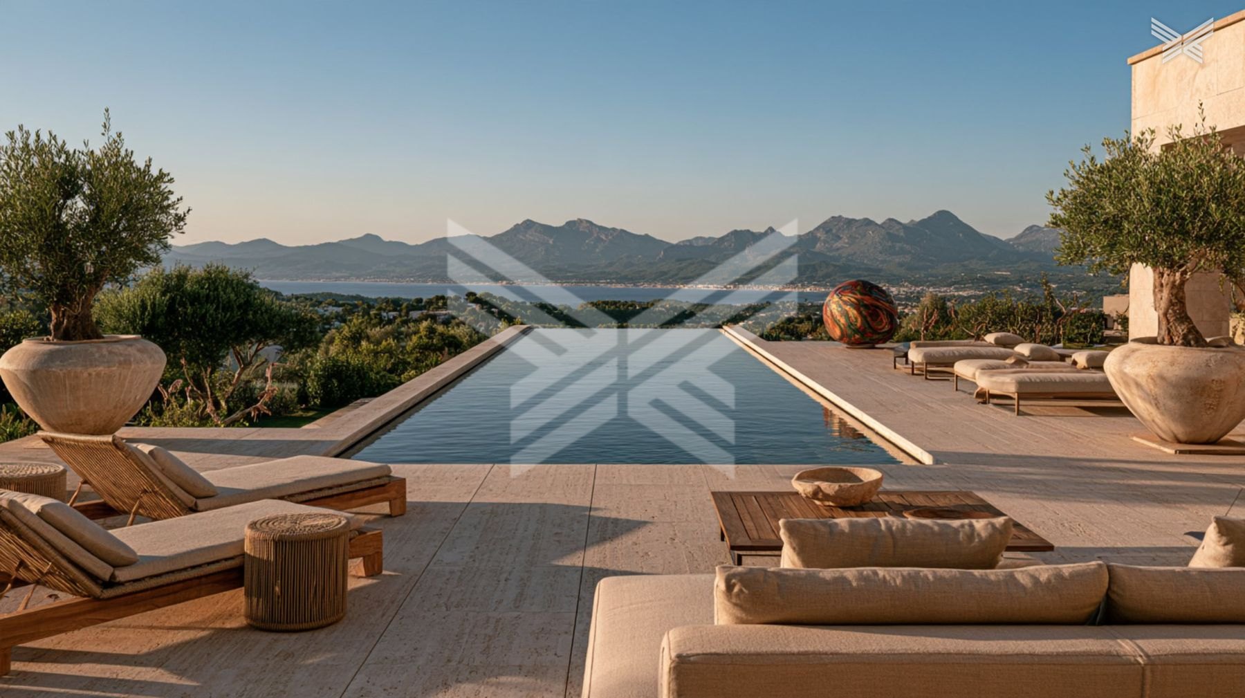 Pool terrace with teak loungers above the Bay of Palma